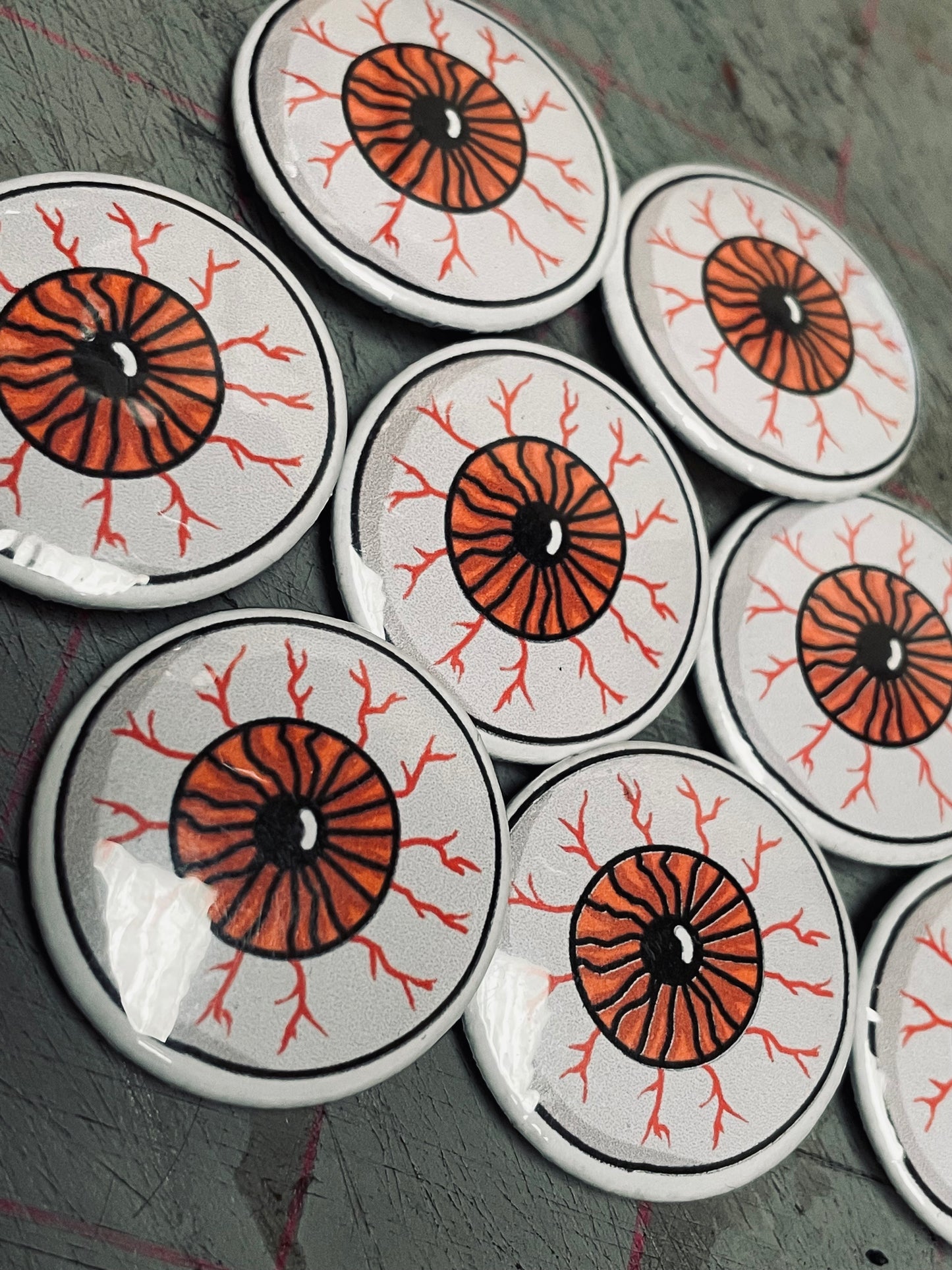 Orange Eyeball Badge (32mm)
