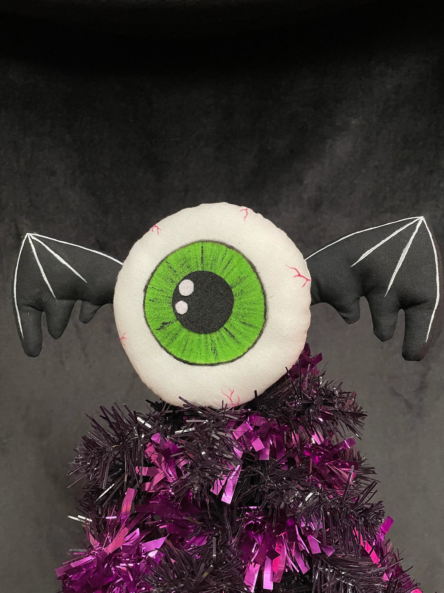 Eyeball with Wings Tree Topper