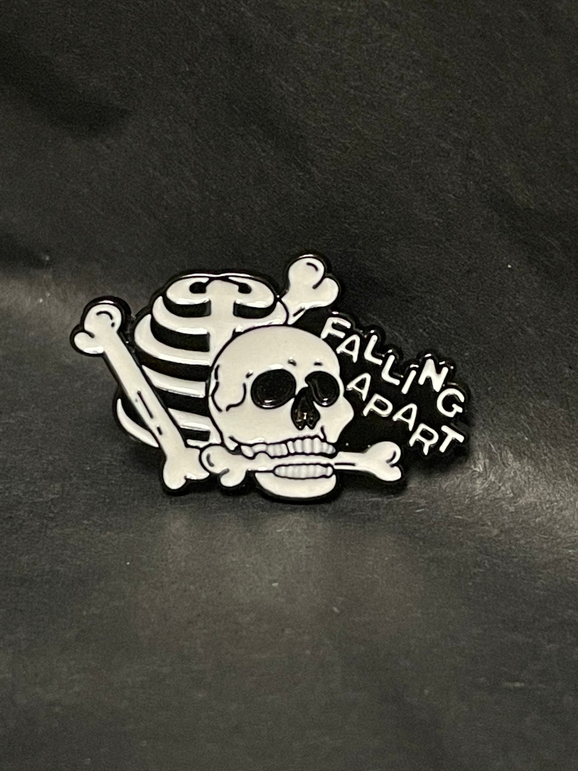 Falling Writing Pin Falling Apart Bones Pin Badge – Pins & Needles Dolls